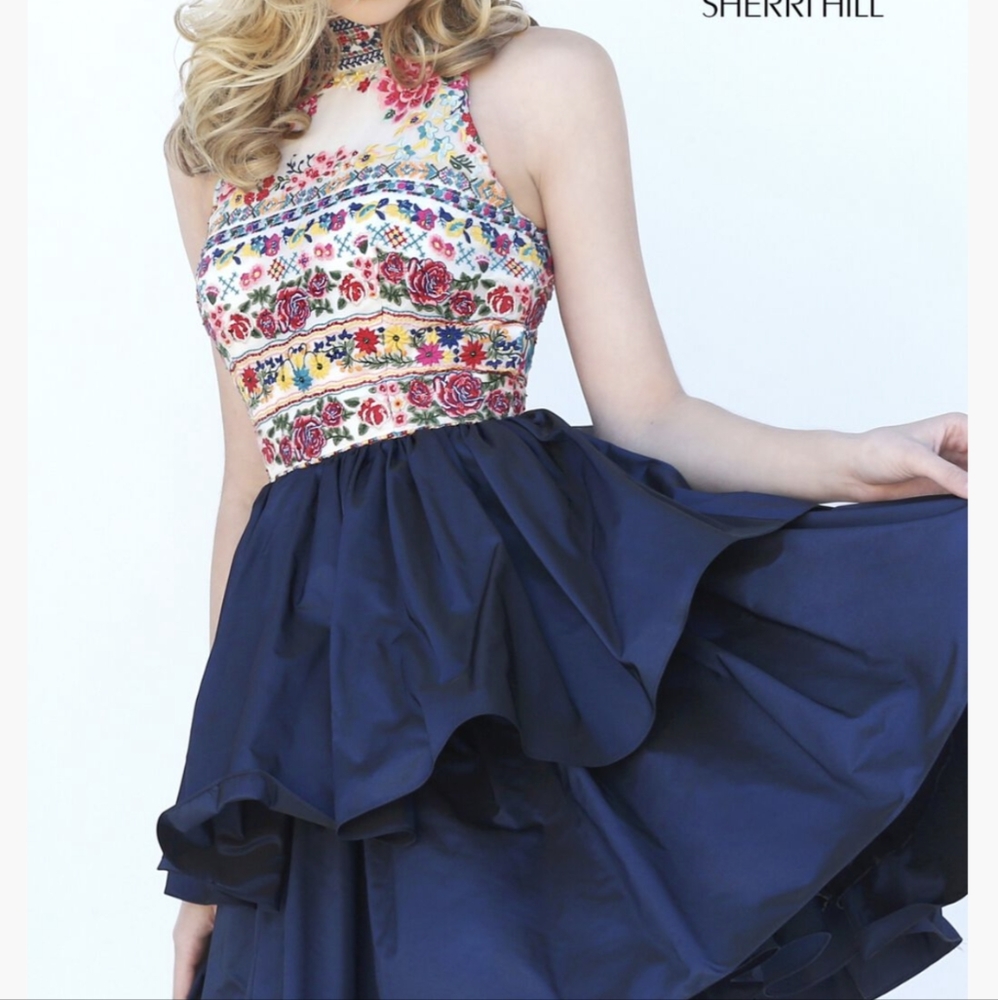 Embroidered open-backed halter dress by Sherri Hill